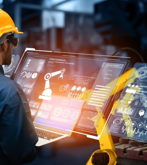 worker-controlling-the-robot-through-a-computer